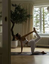Doing yoga in a peaceful park